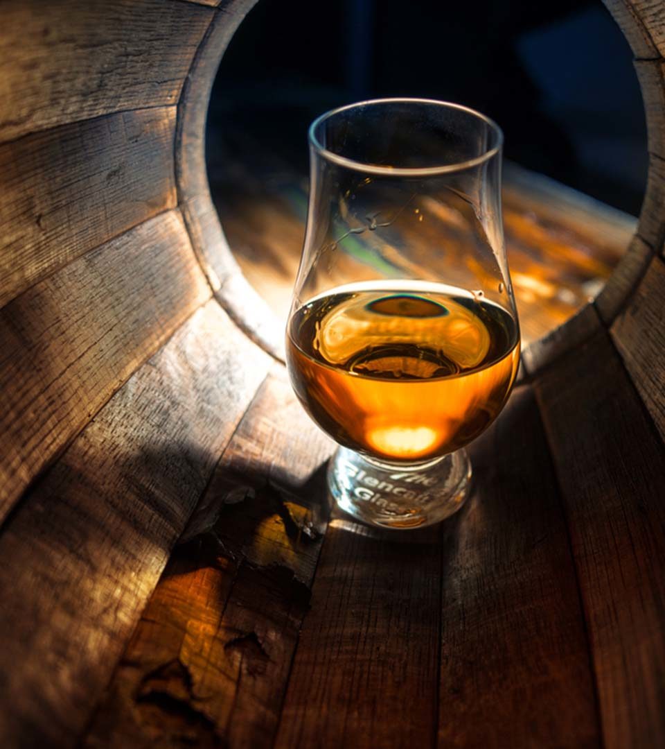 A dram of whisky in an empty cask