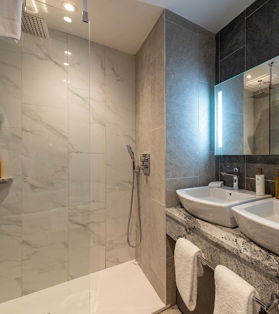 Luxury bathroom with walk in shower at Ness Walk hotel in Inverness