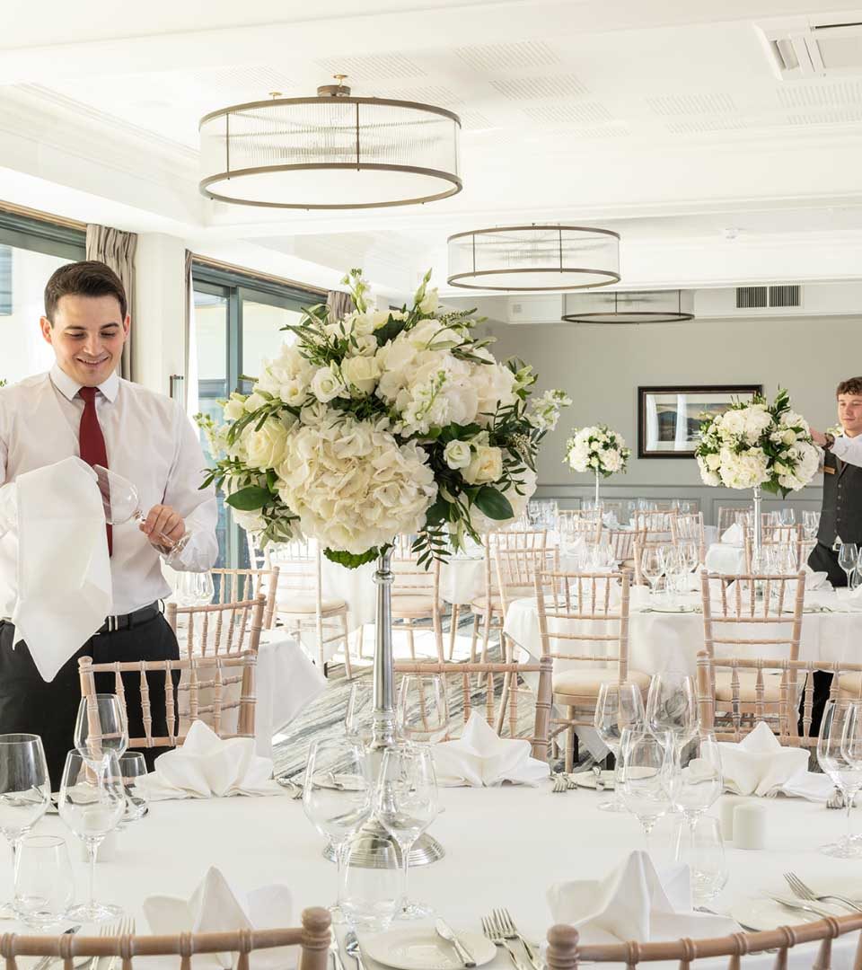 Staff preparing the wedding setting