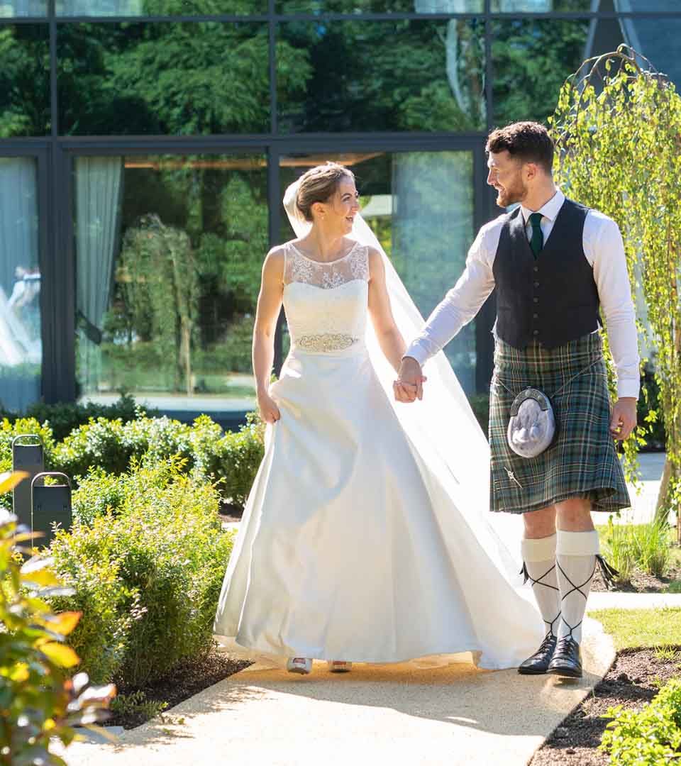 Bride & Groom in courtyard