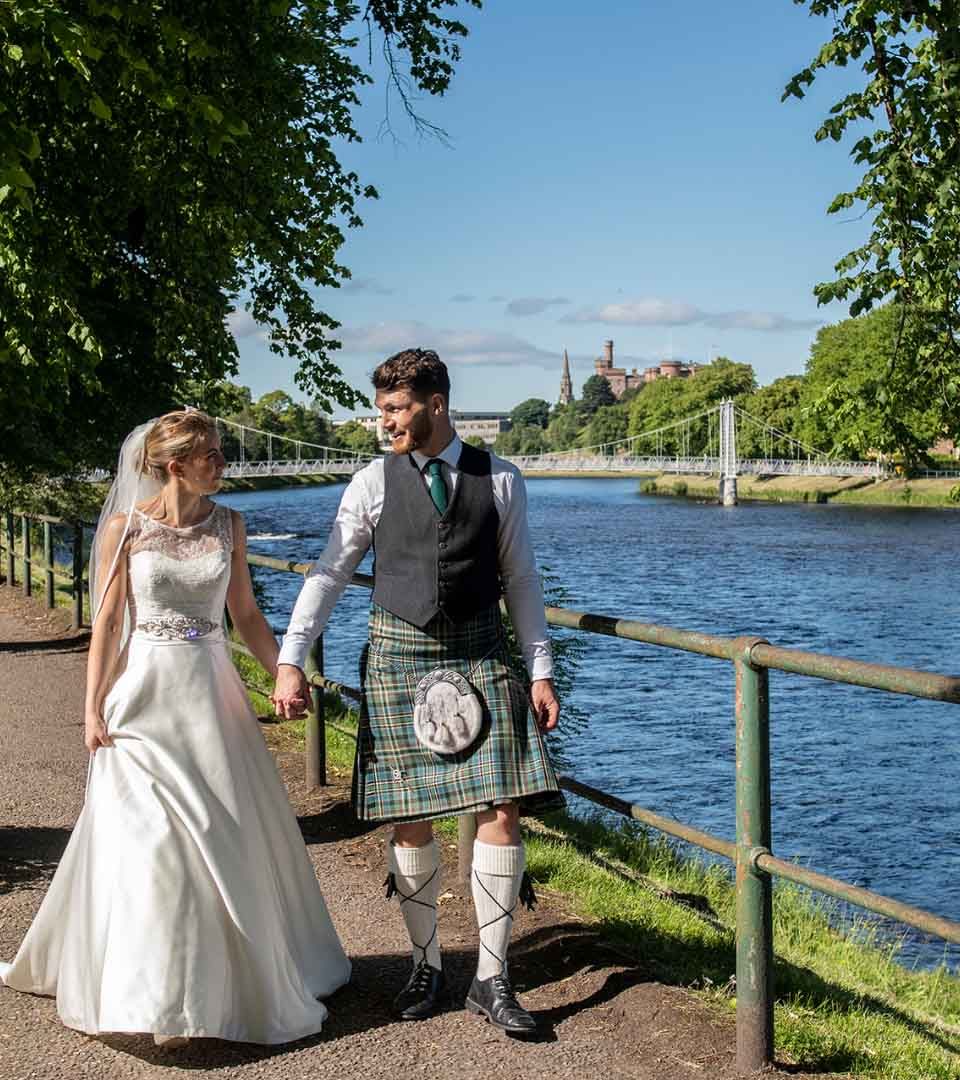 Bride & Groom with Inverness Castle in Background