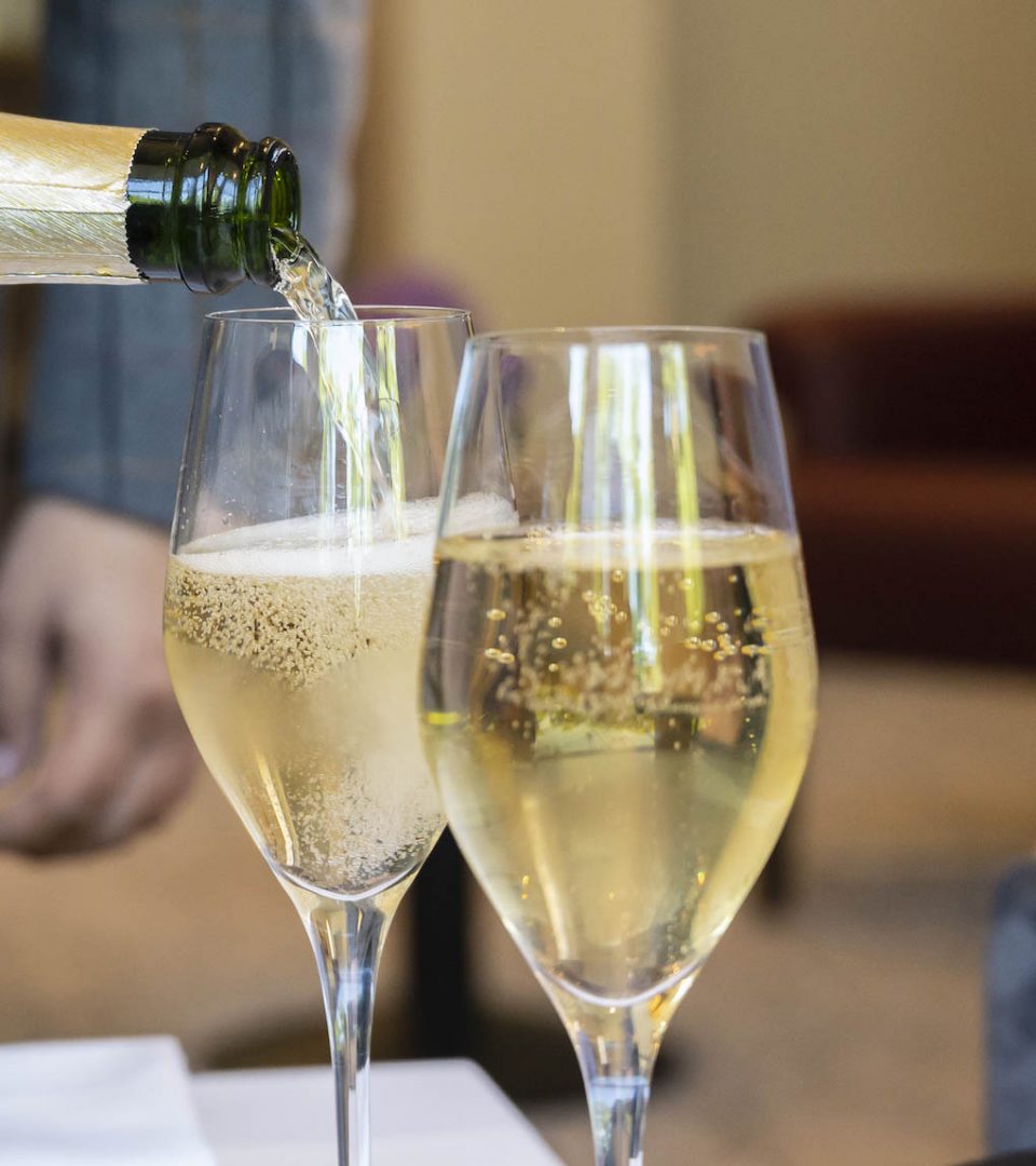 champagne being poured into glass