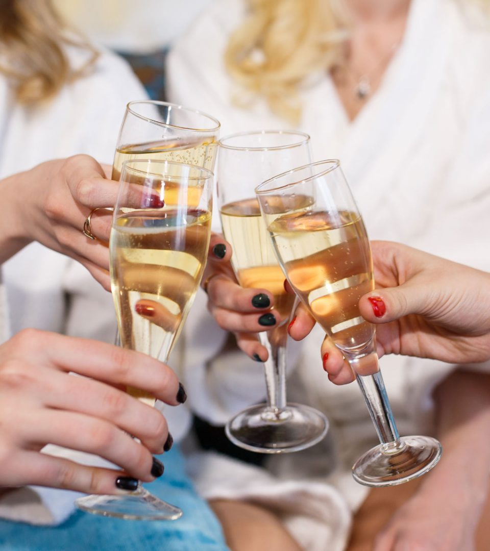 Group of ladies enjoying spa day and drinking Champagne