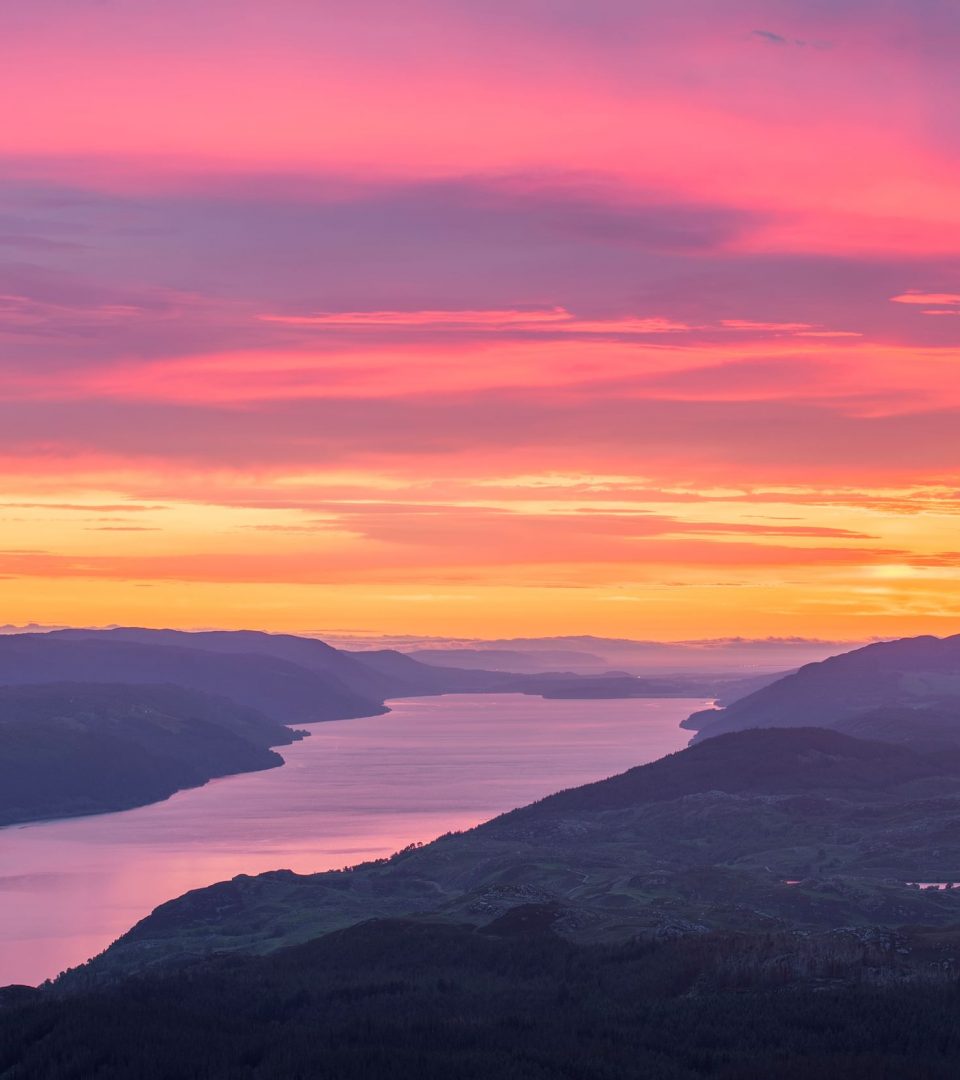 sunrise aerial shot on Loch Ness