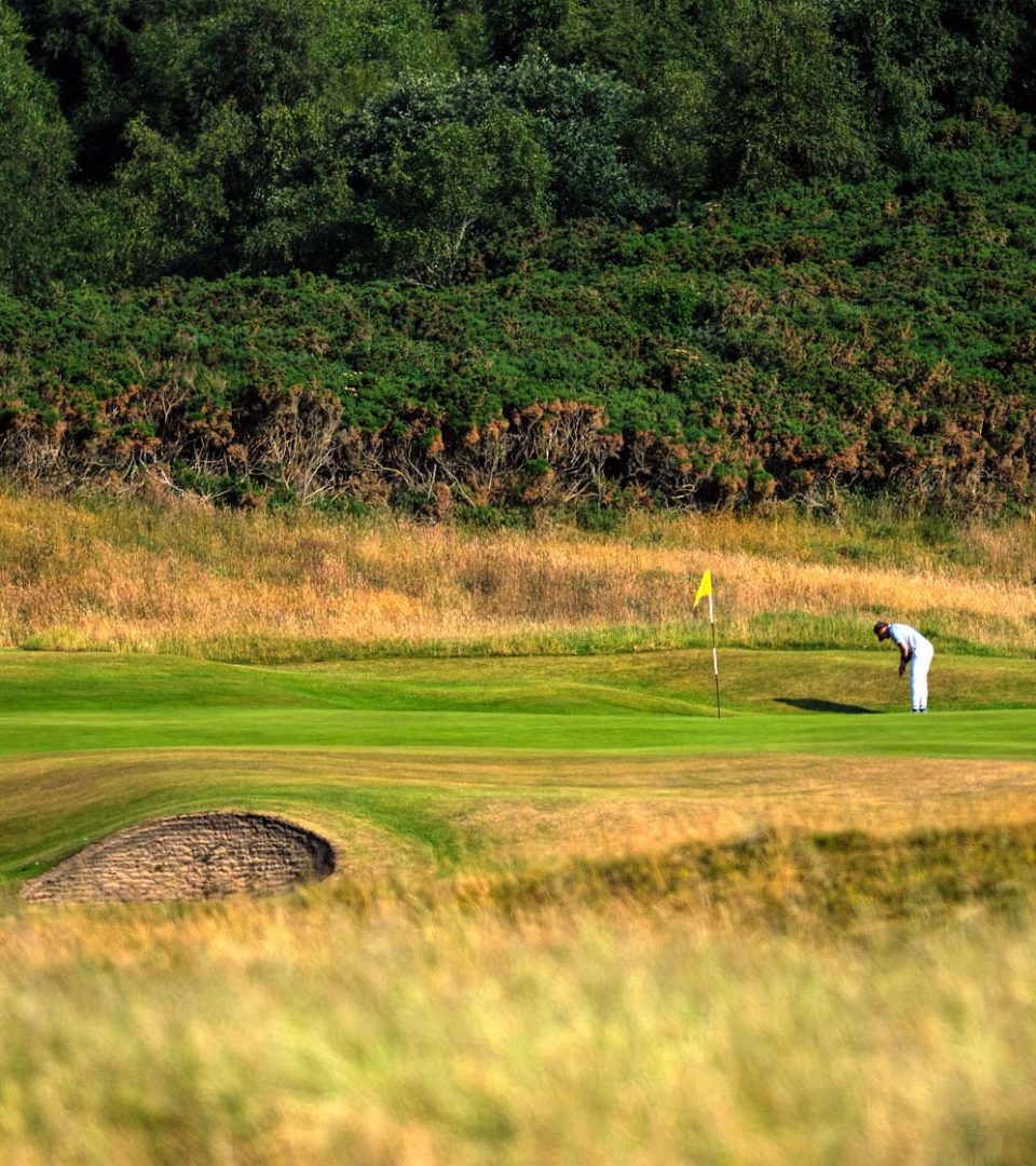 Golfers on links course at Royal Dornoch