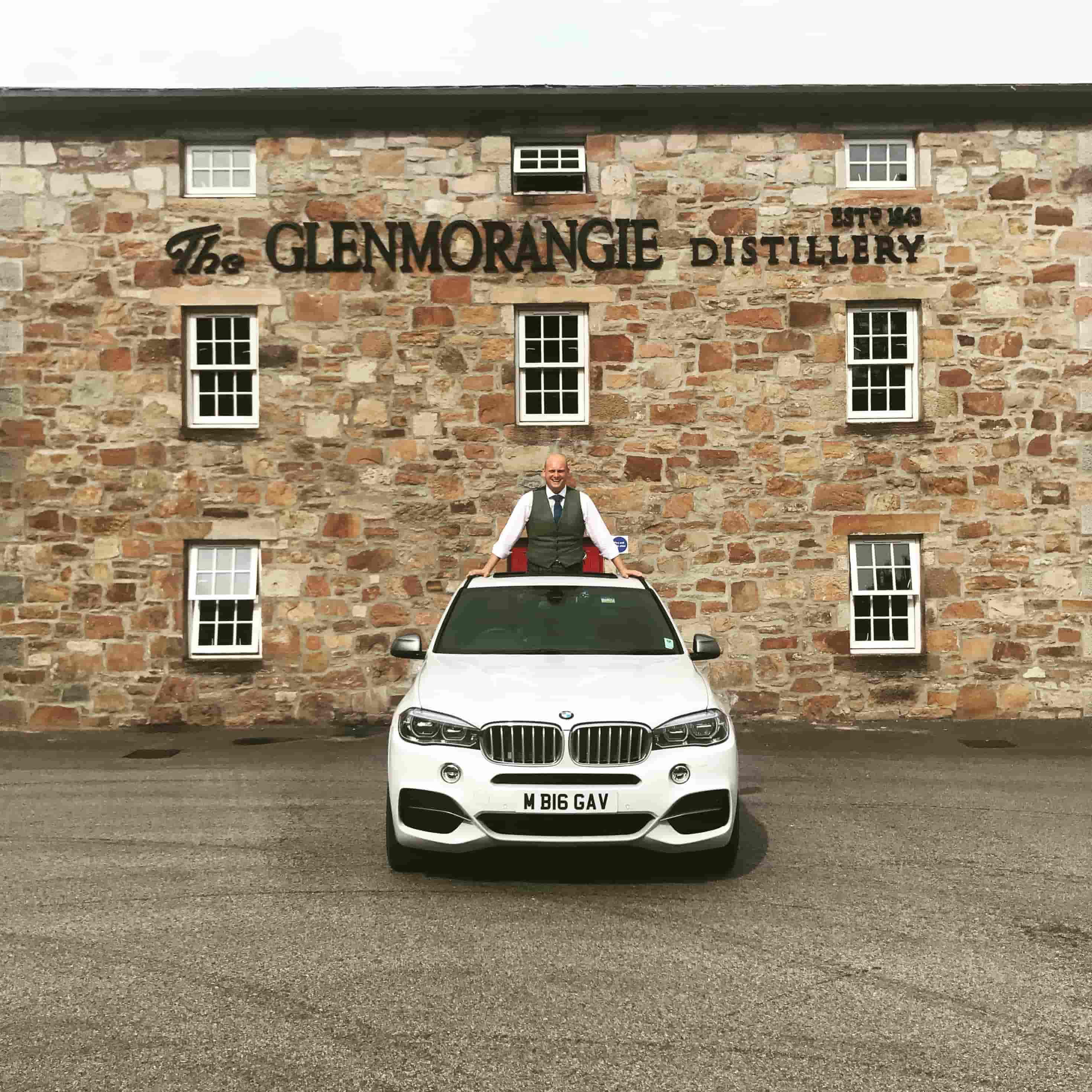 BMW outside Glenmorangie Distillery - Gavin from Inverness Whisky Tours Experience