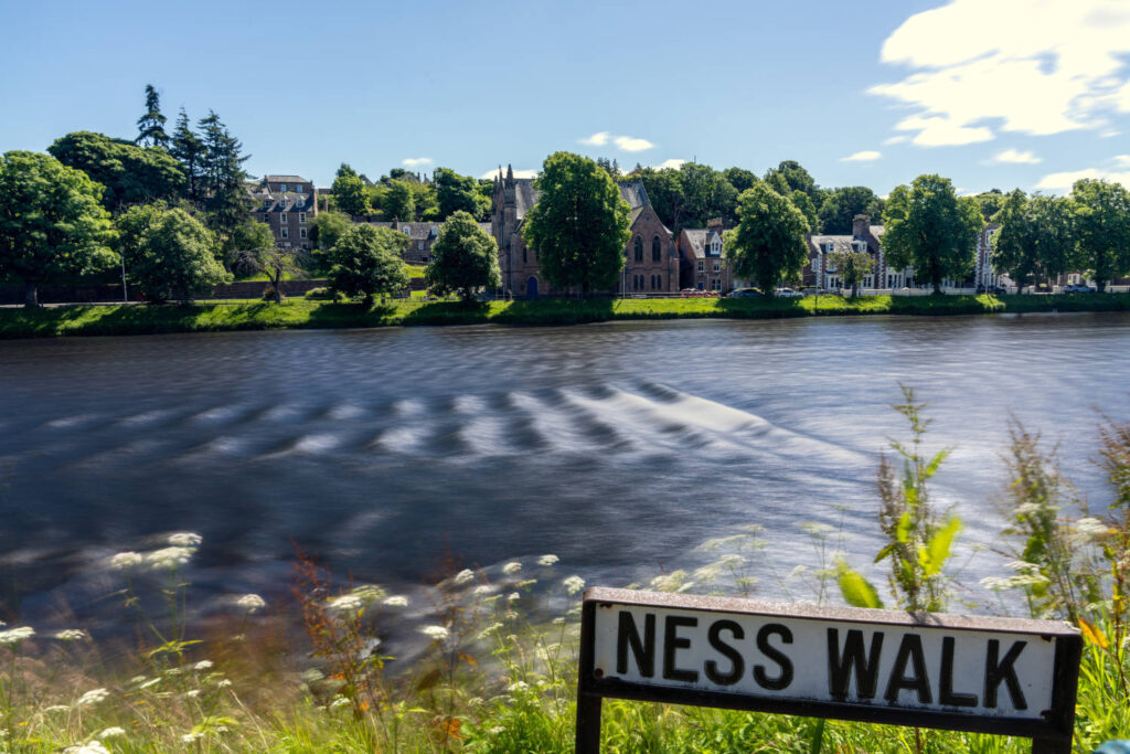 Ness Walk street sign in front of the river